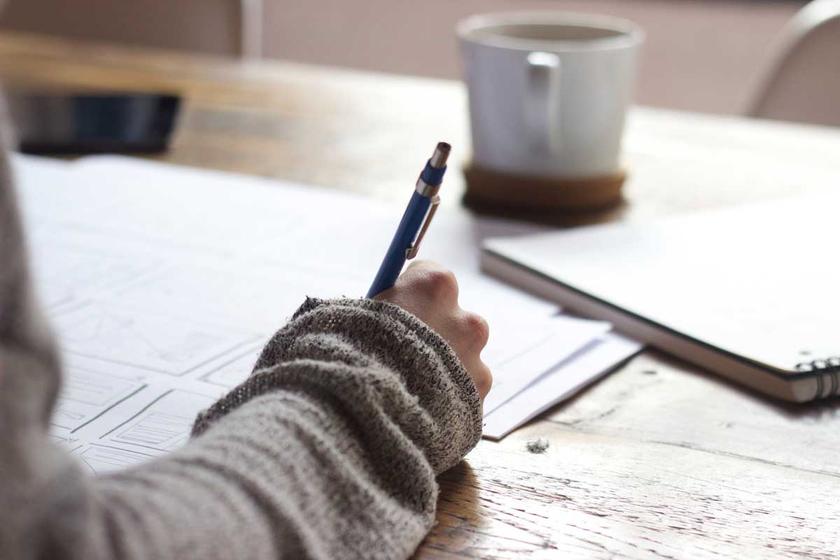 woman writing note