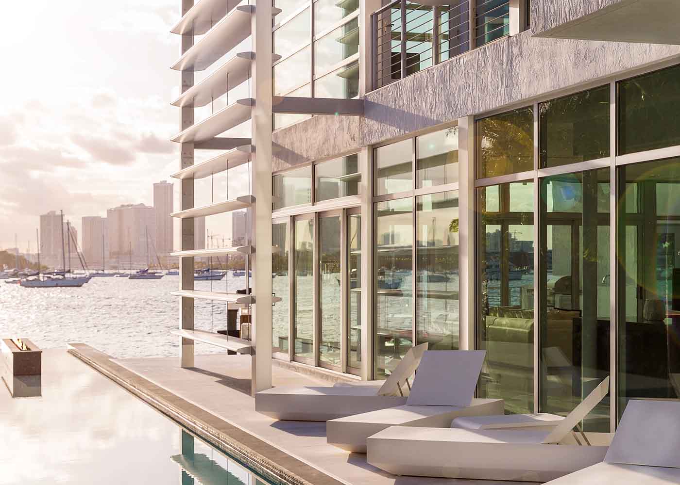 Luxury hotel and view of pool