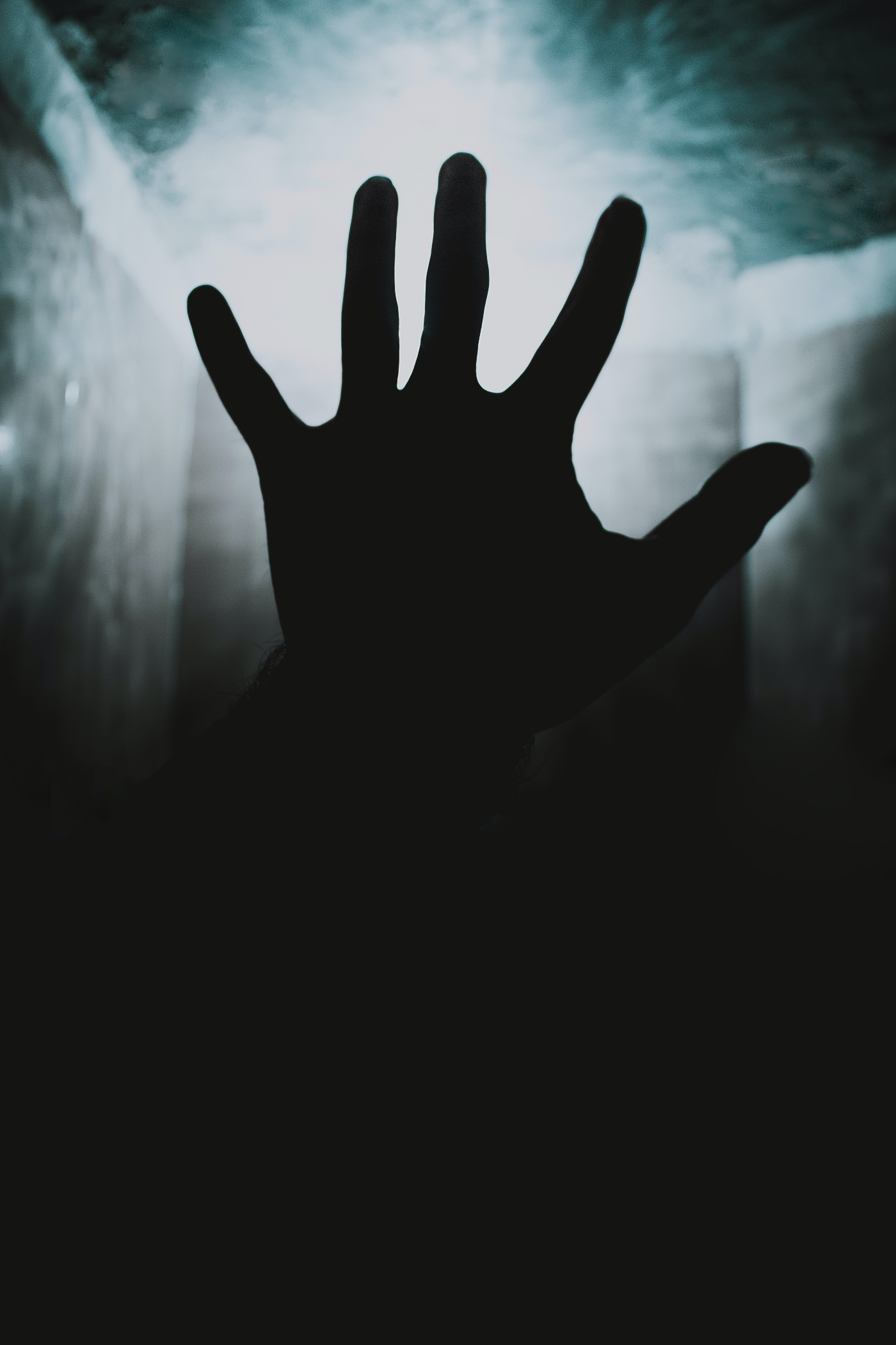 An open hand in shadow