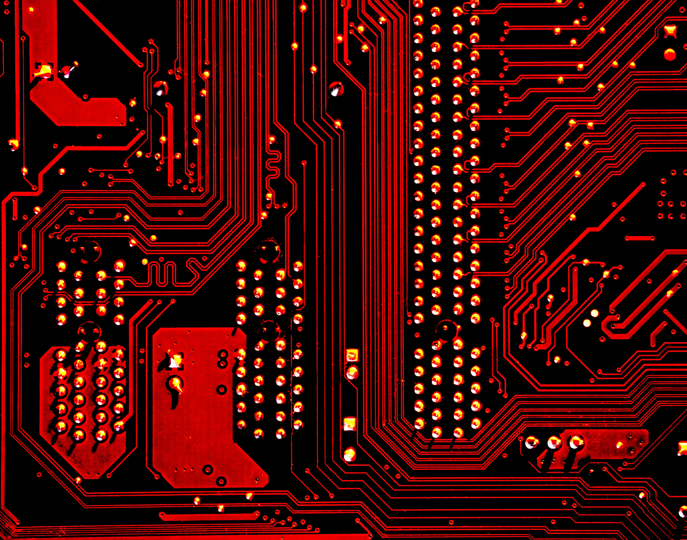 A red, black and gold circuit board