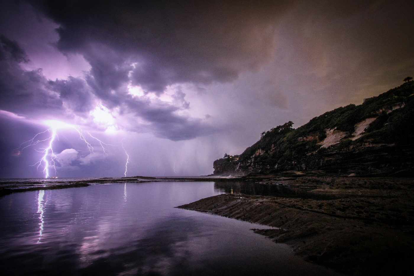 A storm over the sea with lightning strikes