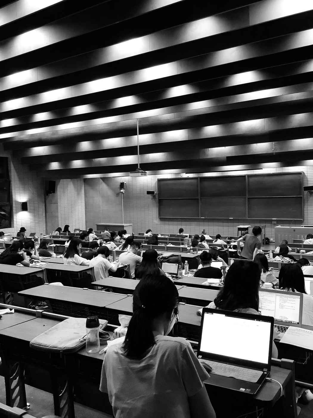 A back and white image of a college lecture hall