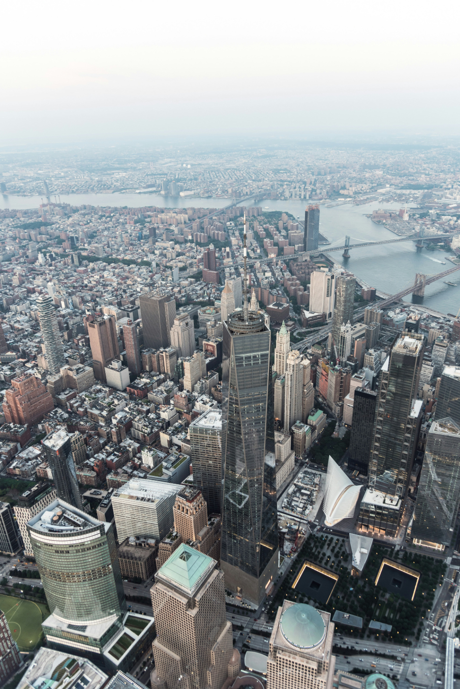 An aerial view of a city on a foggy day