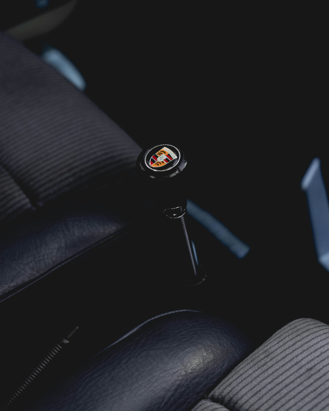 Interior of a Porsche highlighting the gear shift