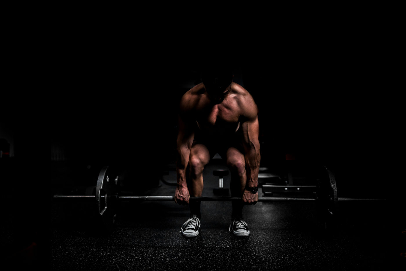 A muscular man lifting weights