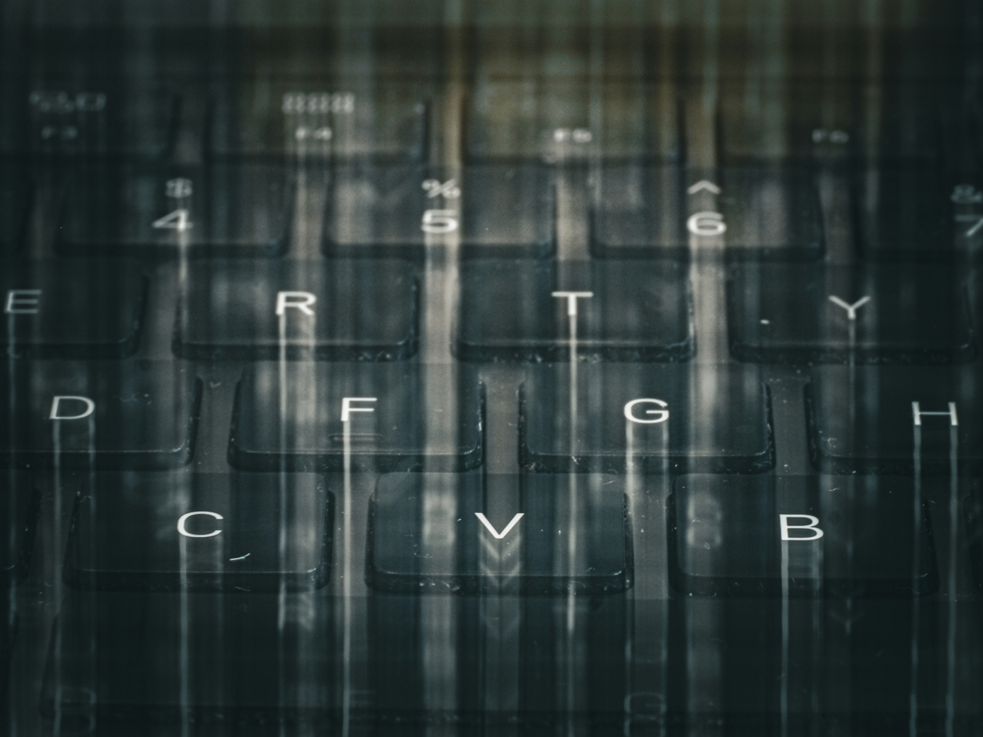 computer keyboard with a fading effect on the keys