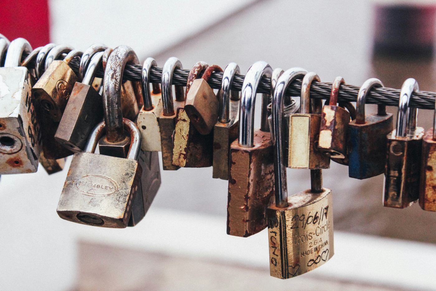 Padlocks on a steel wire on the Ponts des Arts in Paris
