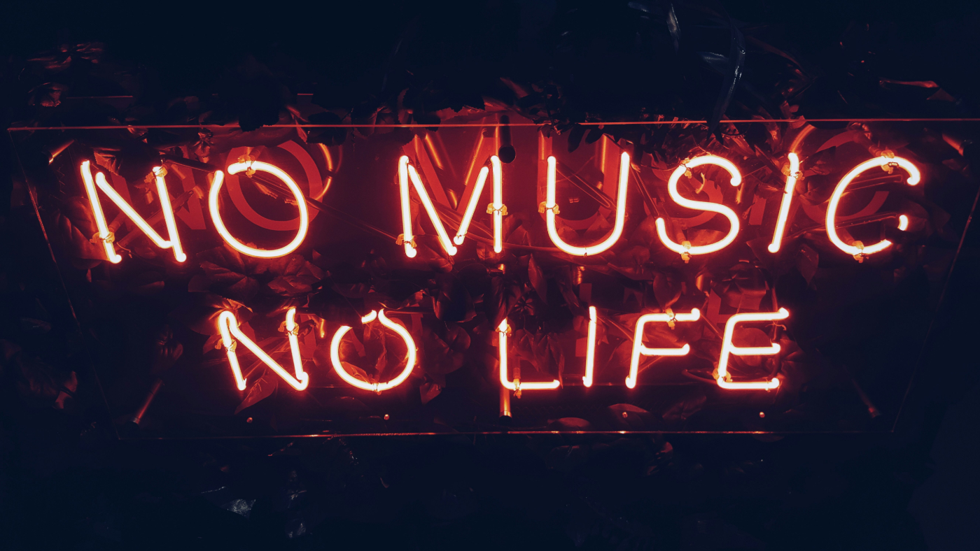 A red neon sign reading No Music, No Life