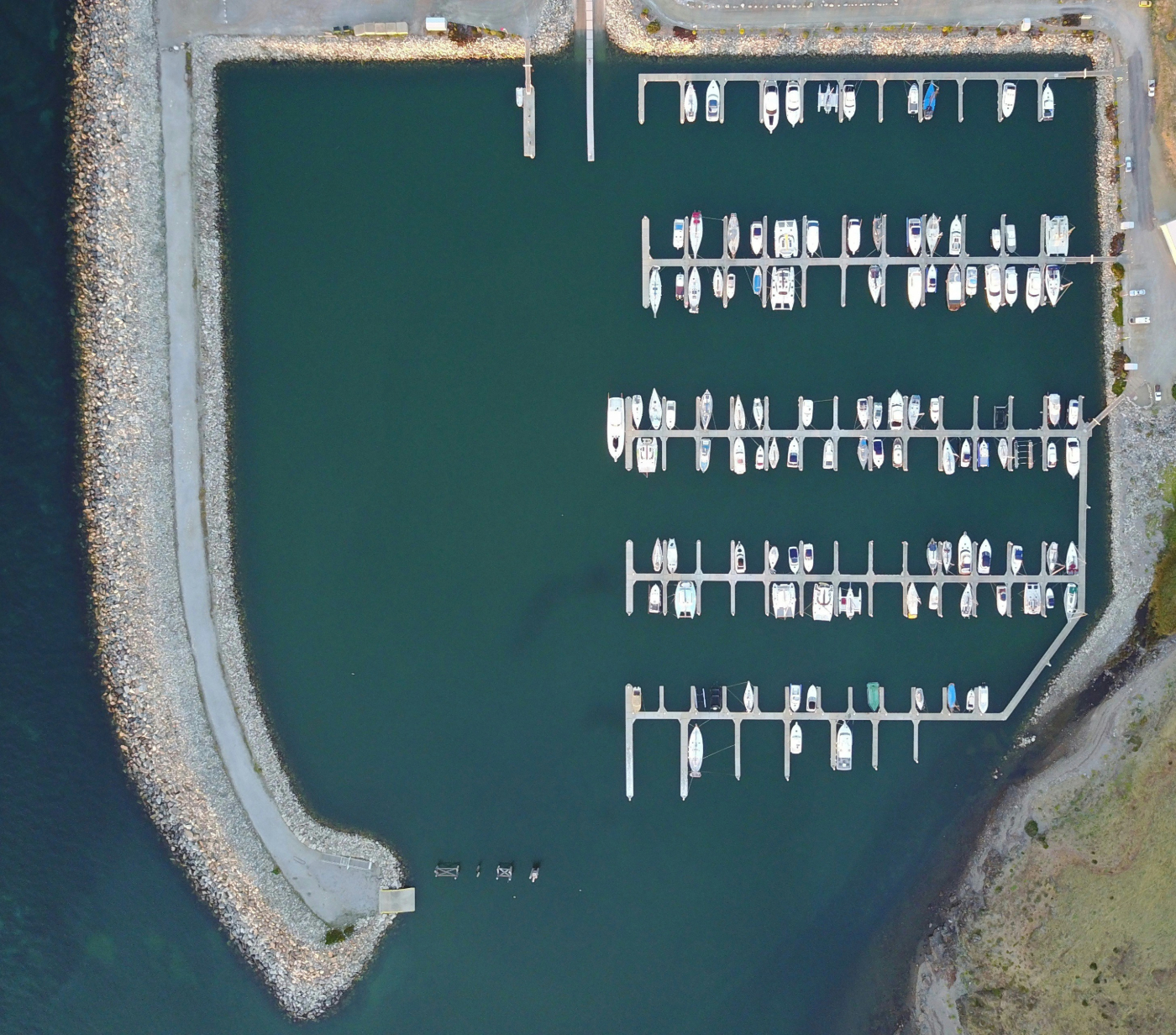 A marina in a protected harbor overhead shot