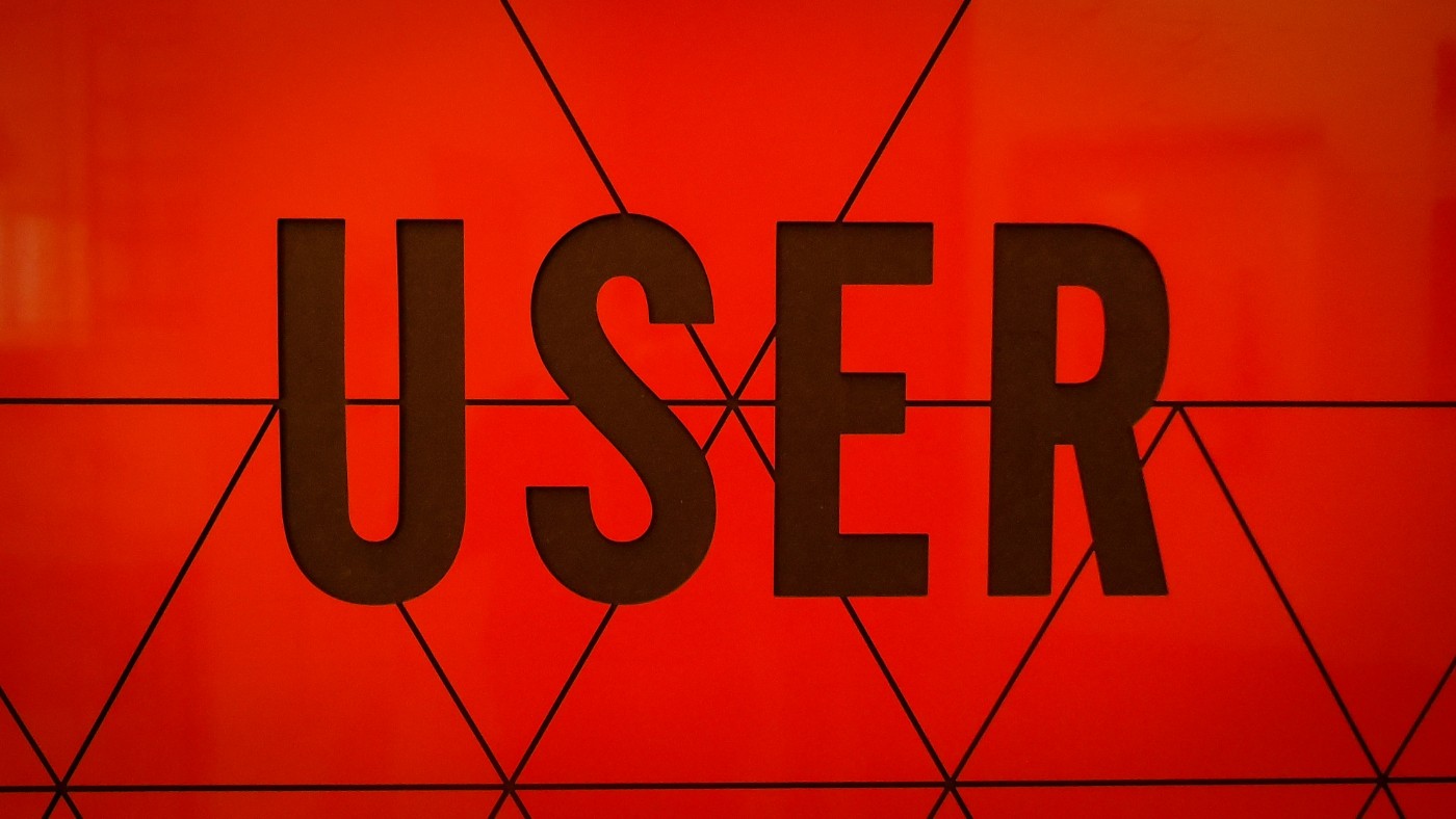 Red and black sign reading USER