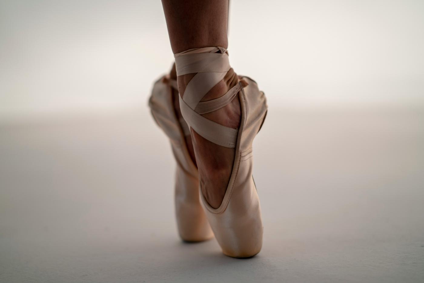 A ballerina's legs from ankle down on point