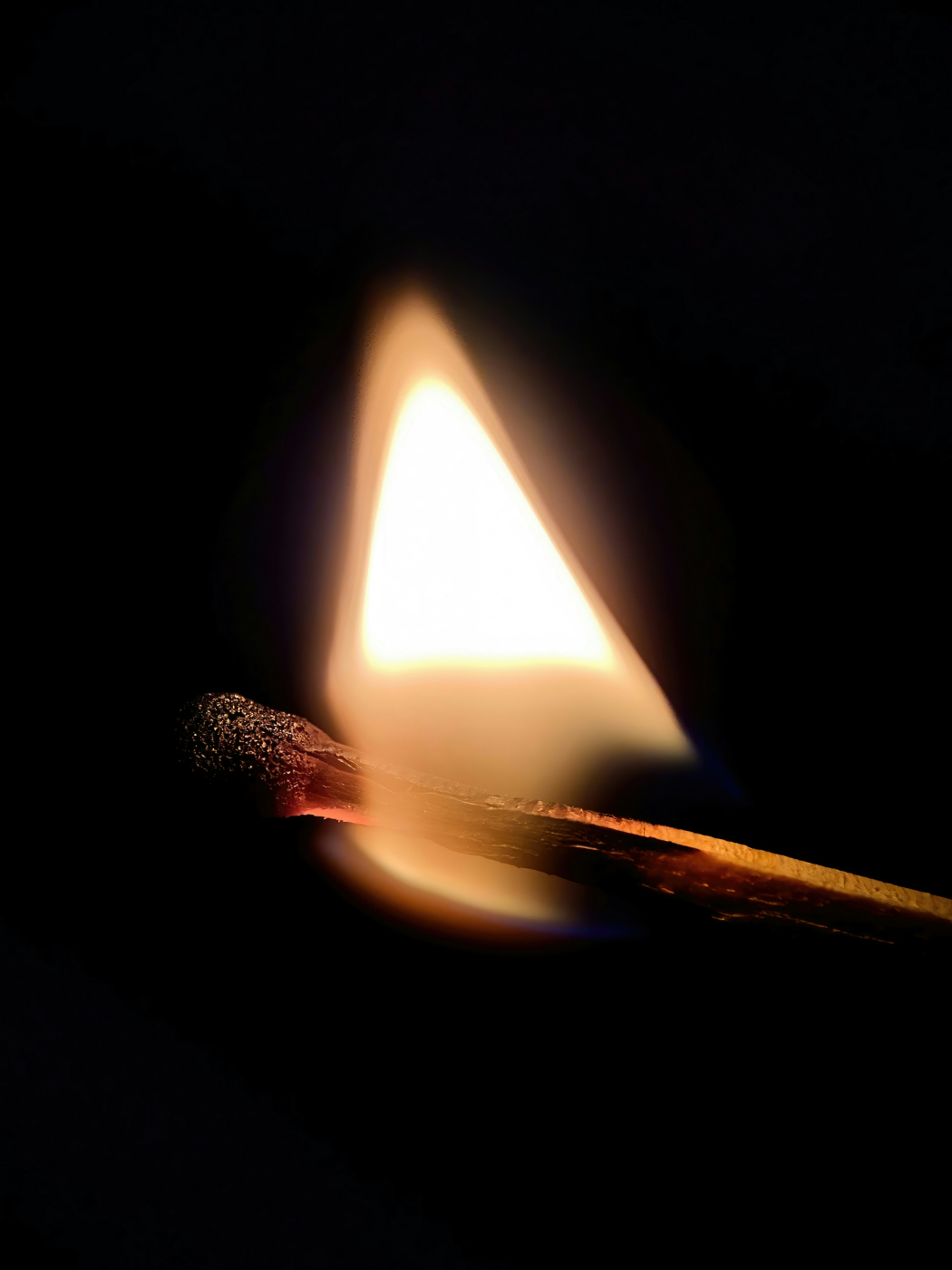 A burning match