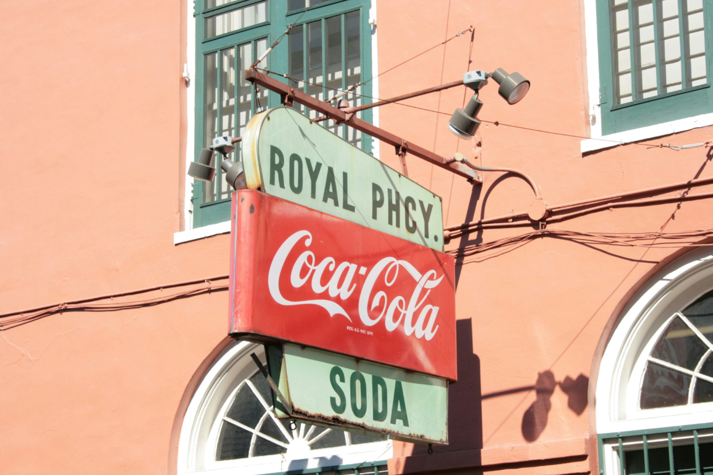 A classic coca-cola sign outside the Royal Pharmacy