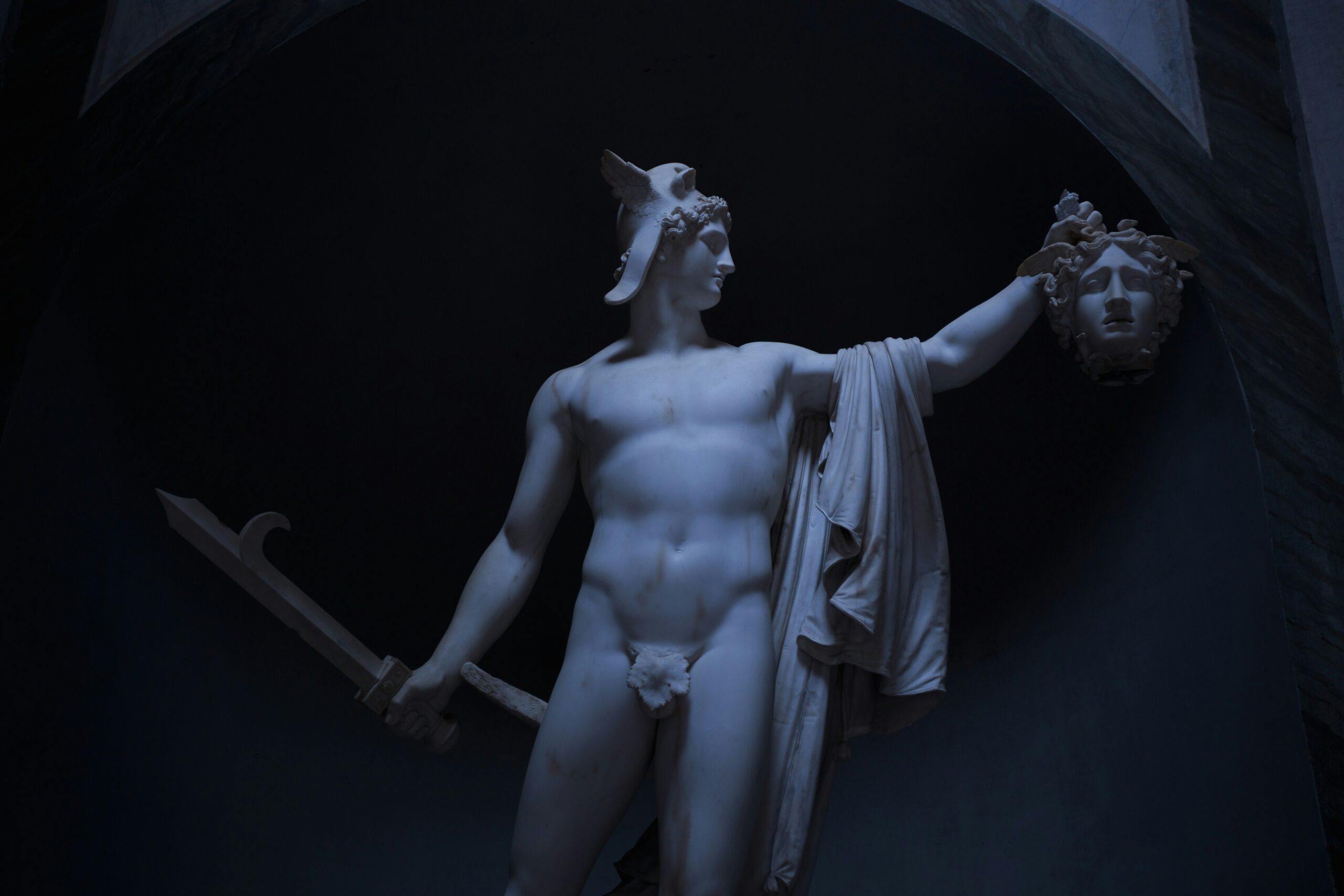 A statue of Perseus holding Medusa's head