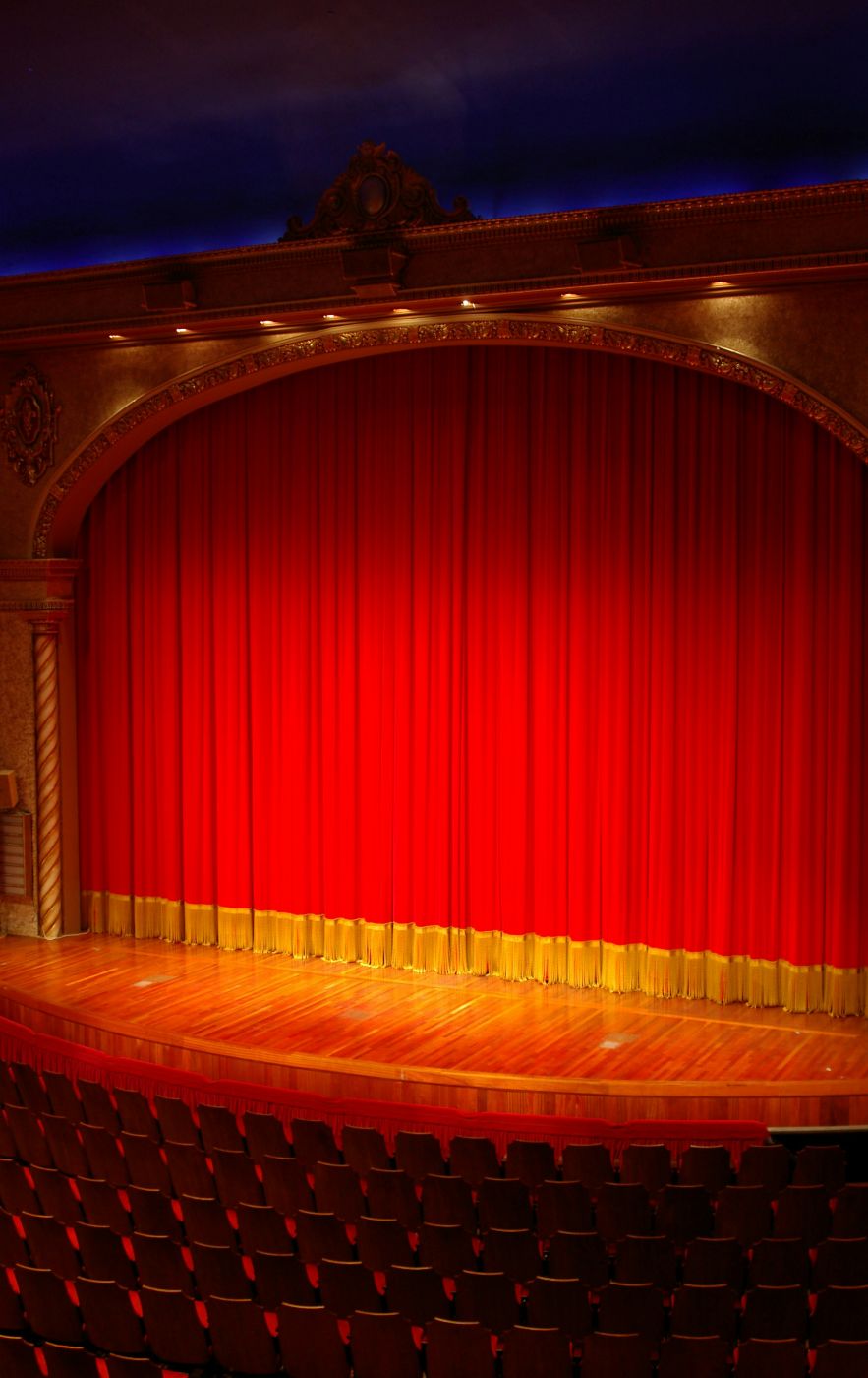 Red and yellow grand drape on a stage