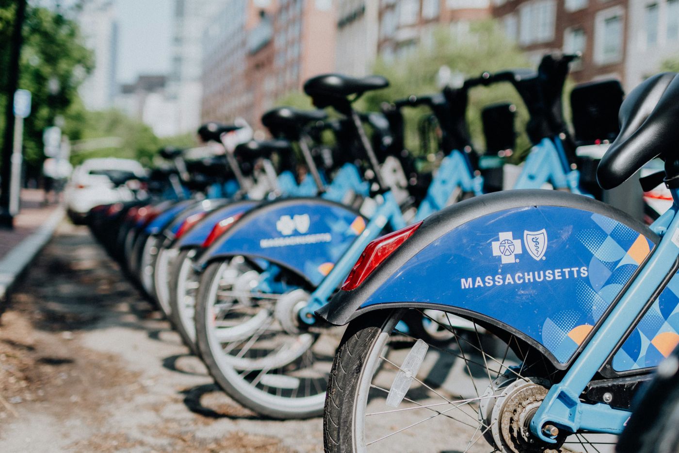 A line of blue rental bikes