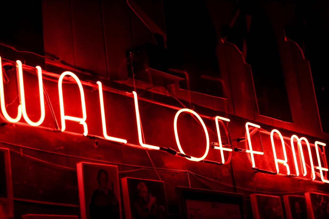 A red neon Wall of fame sign