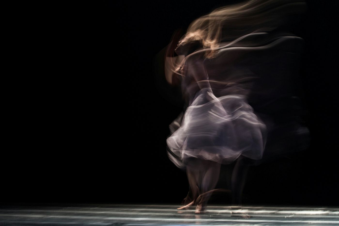A female dancer in full motion