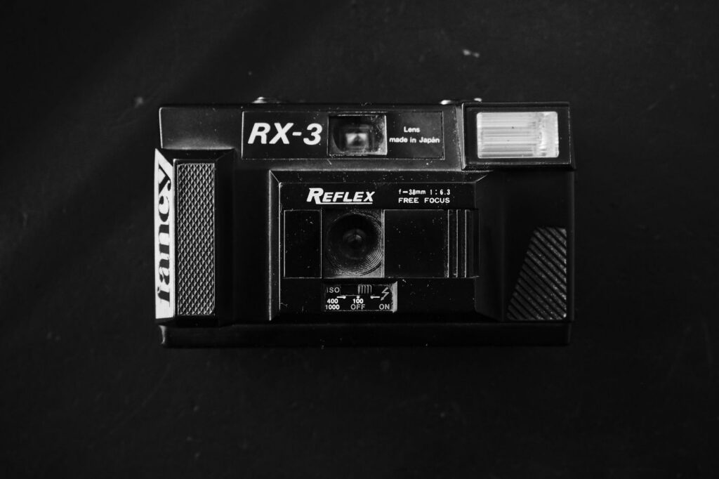 A black RX-3, reflex camera