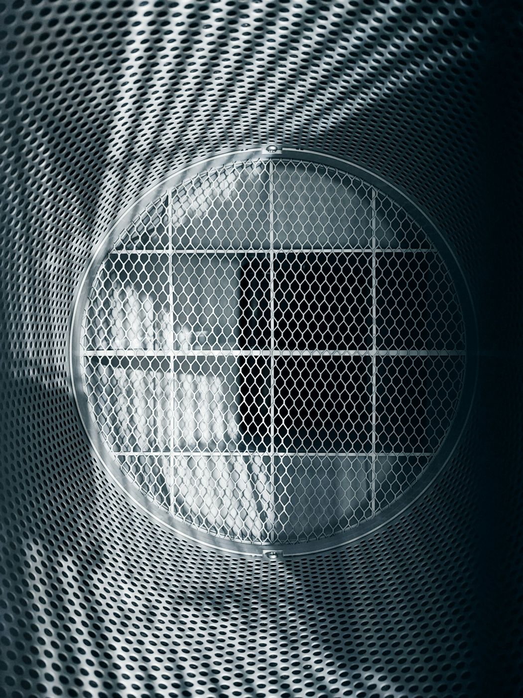 A large, silver industrial air filter
