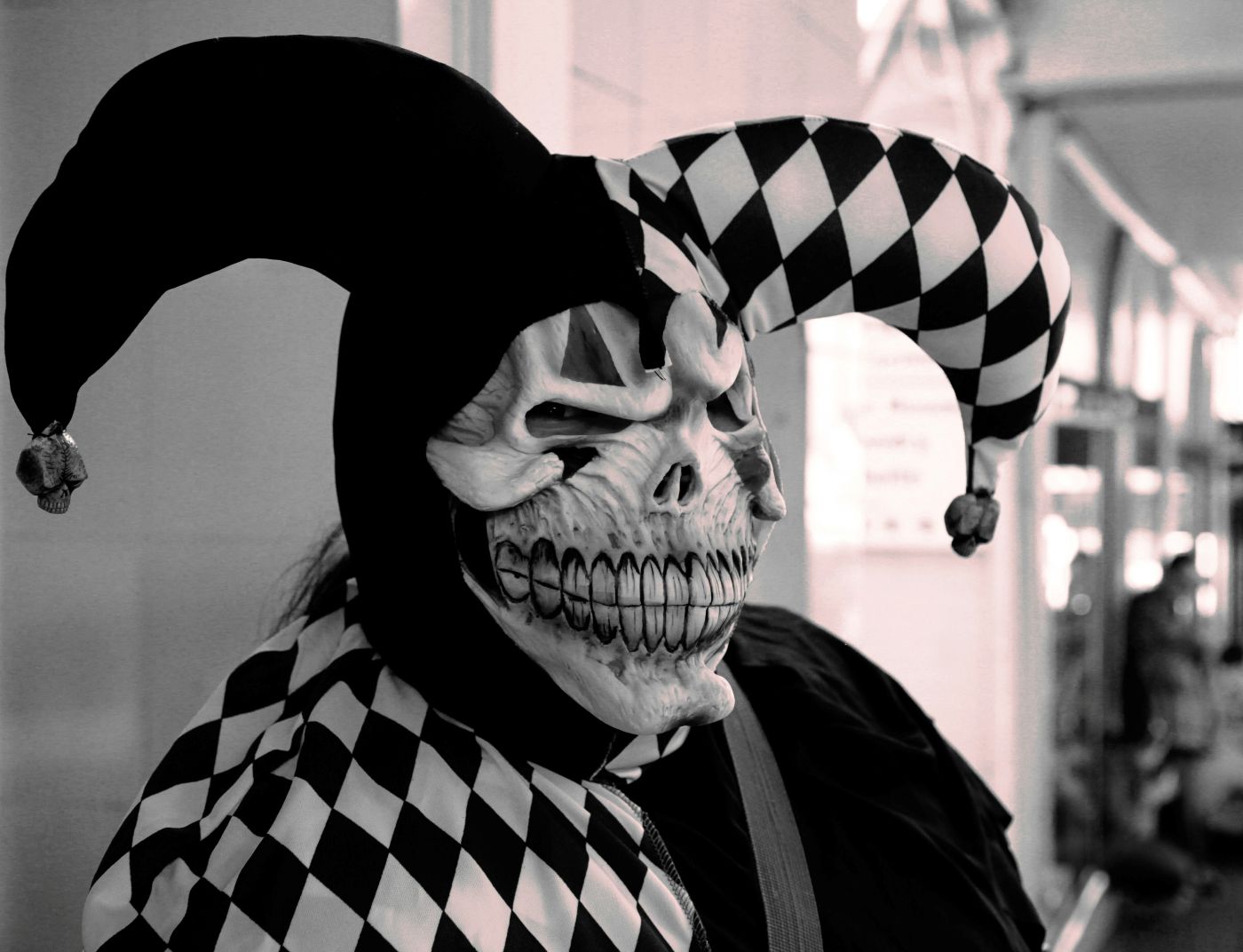 A skeleton in black and white motley
