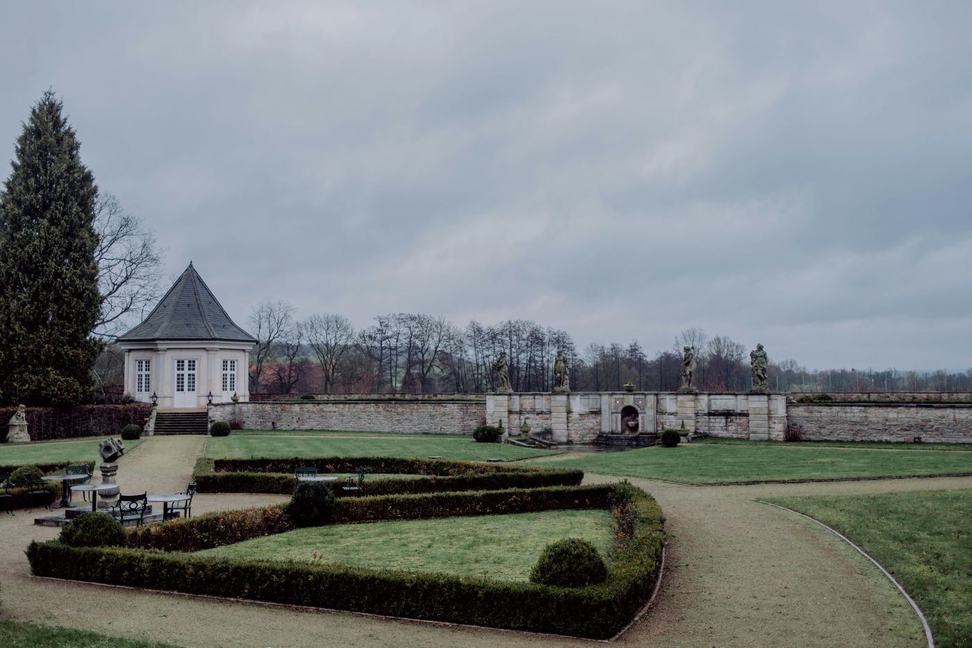 a large, well-manicured lawn and garden
