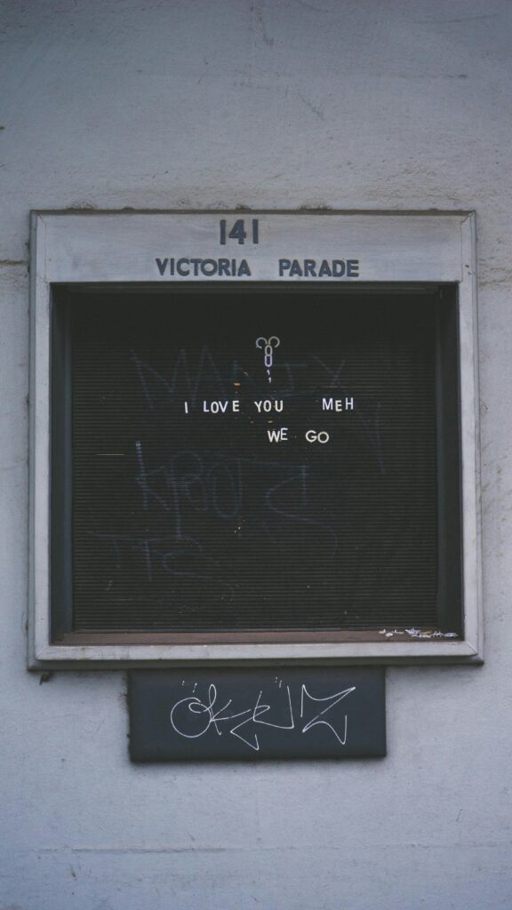 A sign with I Love You Meh We Go on it