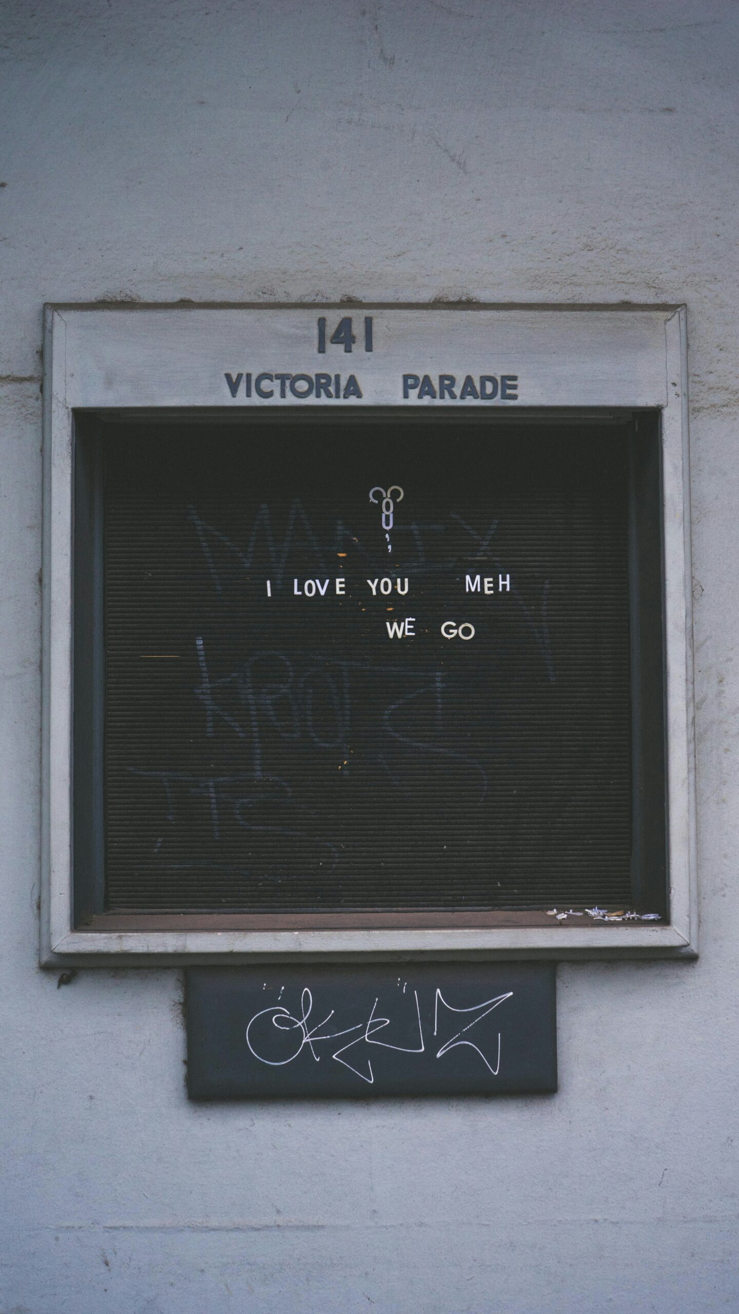 A sign reading I love you MEH we Go