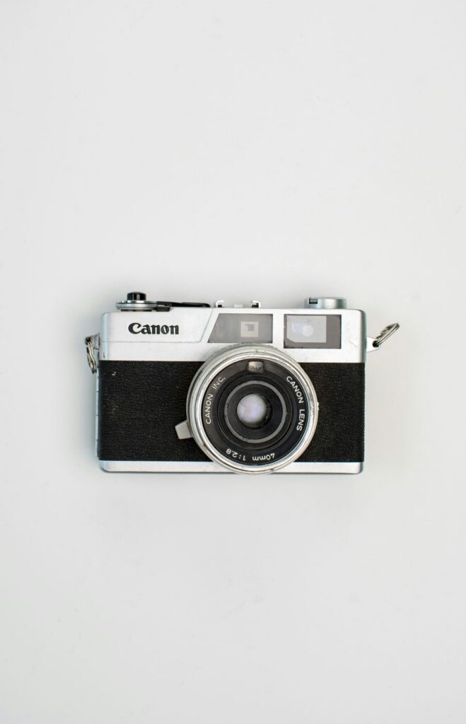 a black and white of a Canon camera