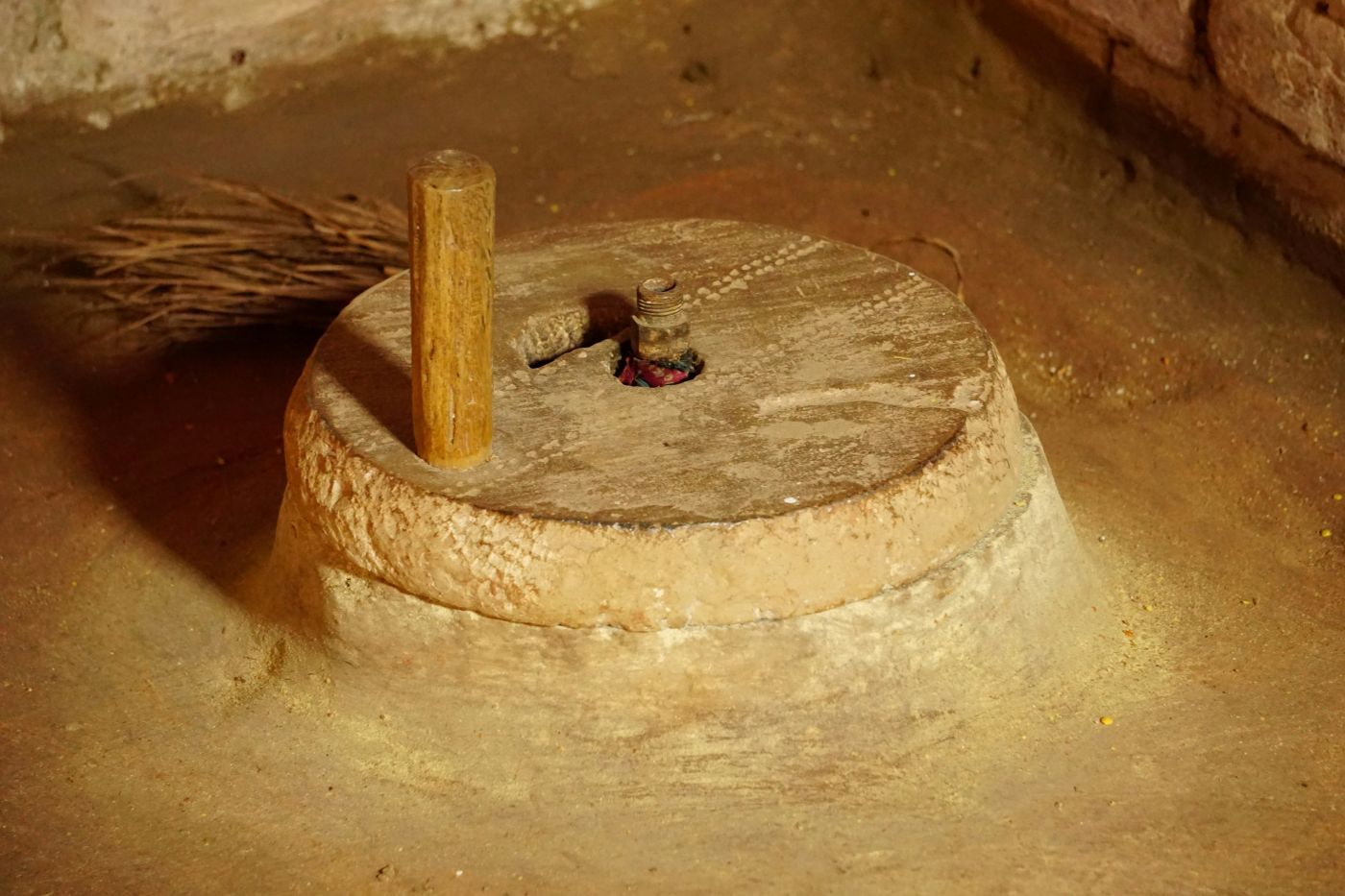 ancient in-ground butter churn